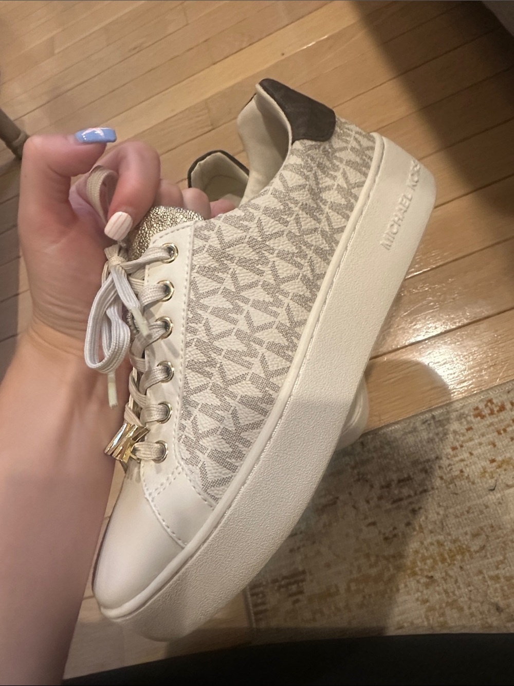 Michael Kors Cream and Gold MK Logo Low-Top Sneakers - Picture 9 of 12